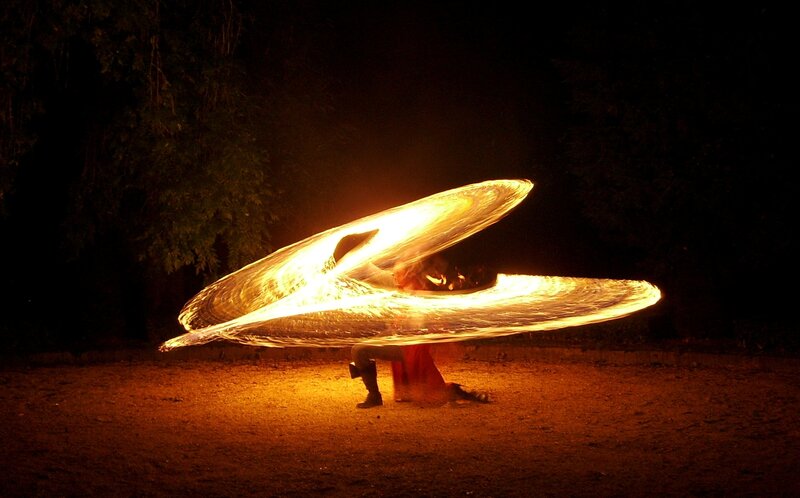 Fire dancer at night