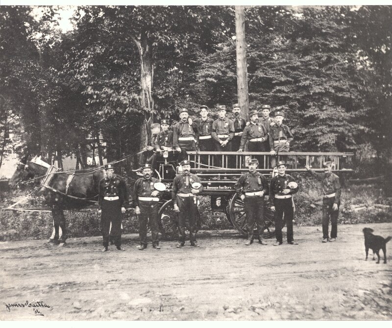 Fire department with horse-drawn engine