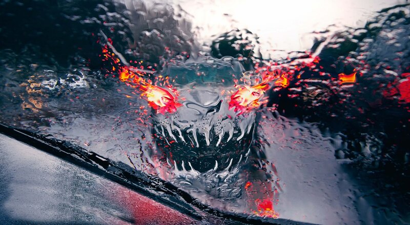 Fire-eyed Creature in Rain