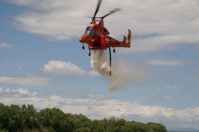 Fire helicopter dropping water