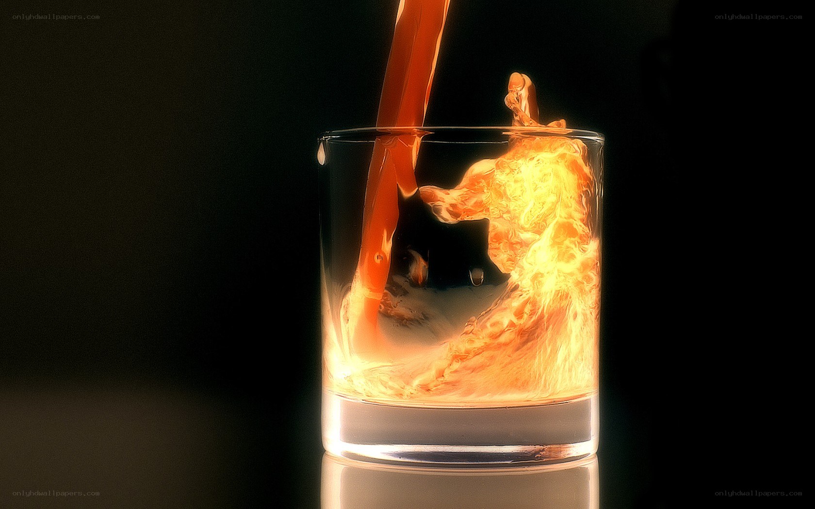 Fire-like liquid pouring into glass