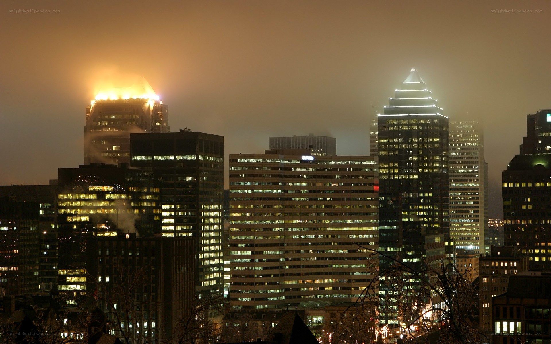 Fire on city building at night
