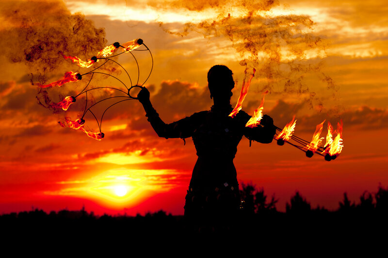 Fire Performer at Sunset