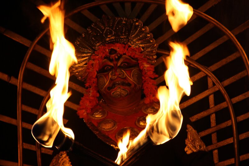 Fire ritual mask performance