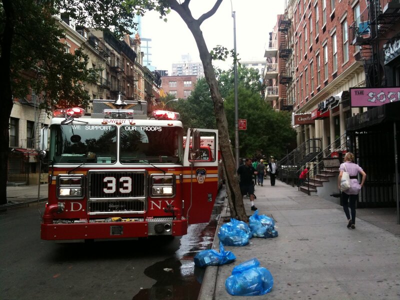 Fire Truck on City Street — Red