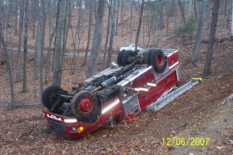 Fire truck overturned in woods