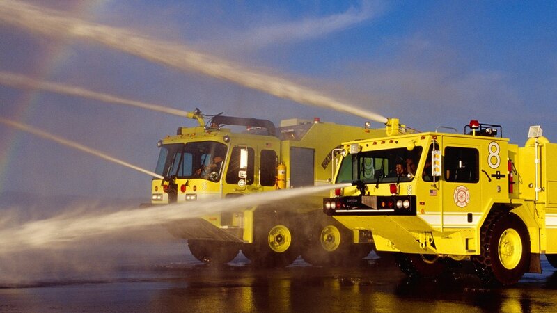 Fire trucks spraying water