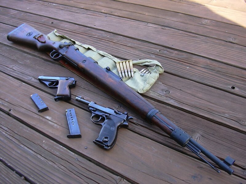 Firearms on wooden deck