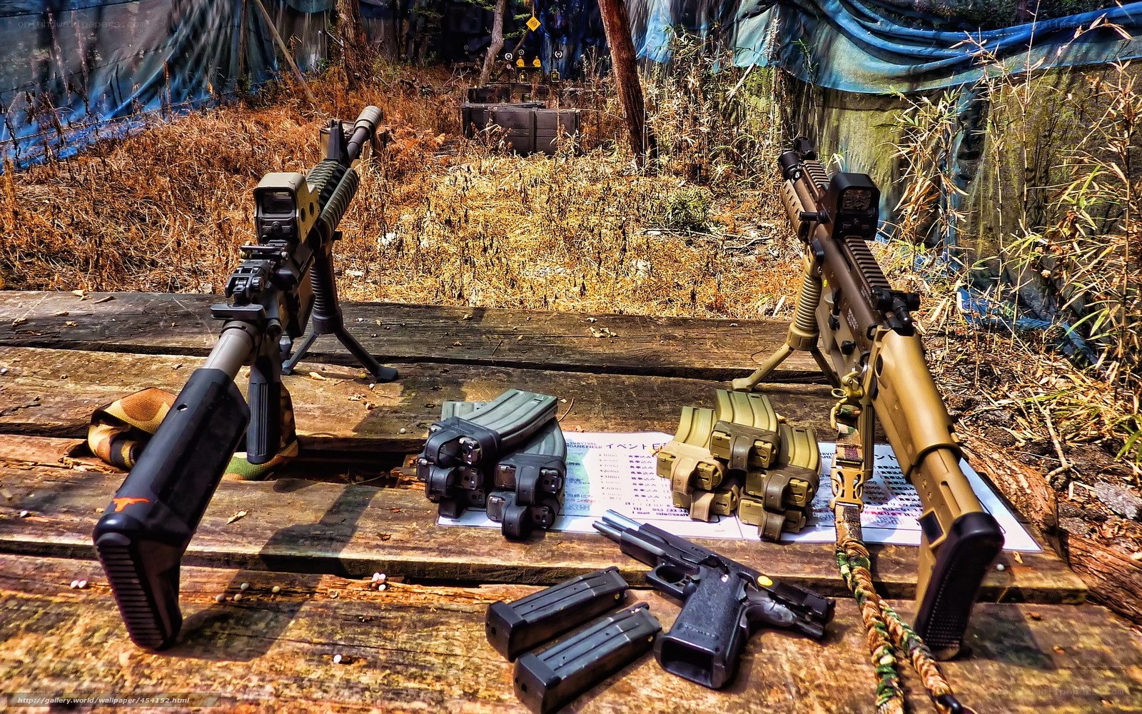Firearms on wooden table
