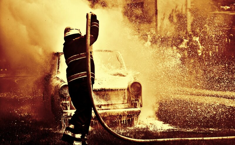 Firefighter Extinguishing Car