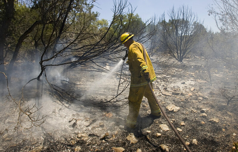 Firefighter Extinguishing Fire