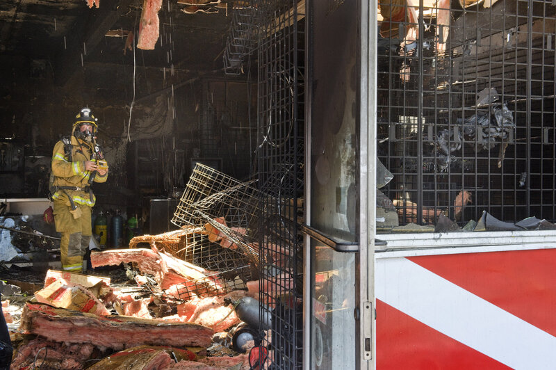 Firefighter in Burned Building