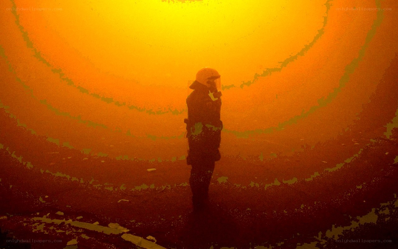 Firefighter in smoke-filled tunnel