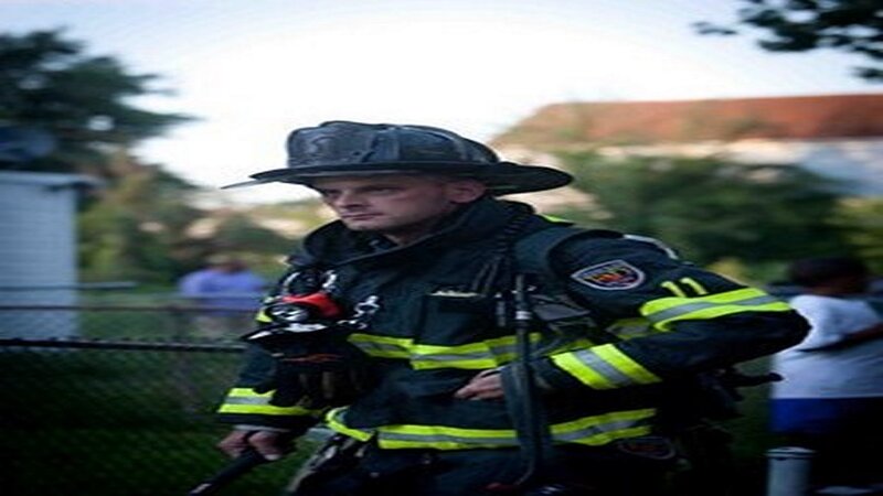 Firefighter in Uniform — Black, Serious