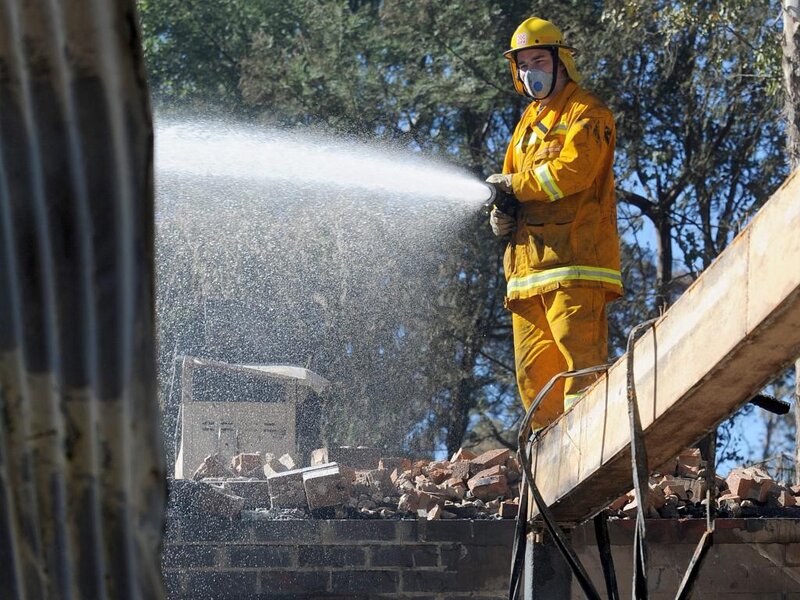 Firefighter Spraying Water