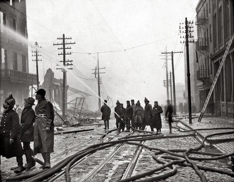 Firefighters at a city fire scene
