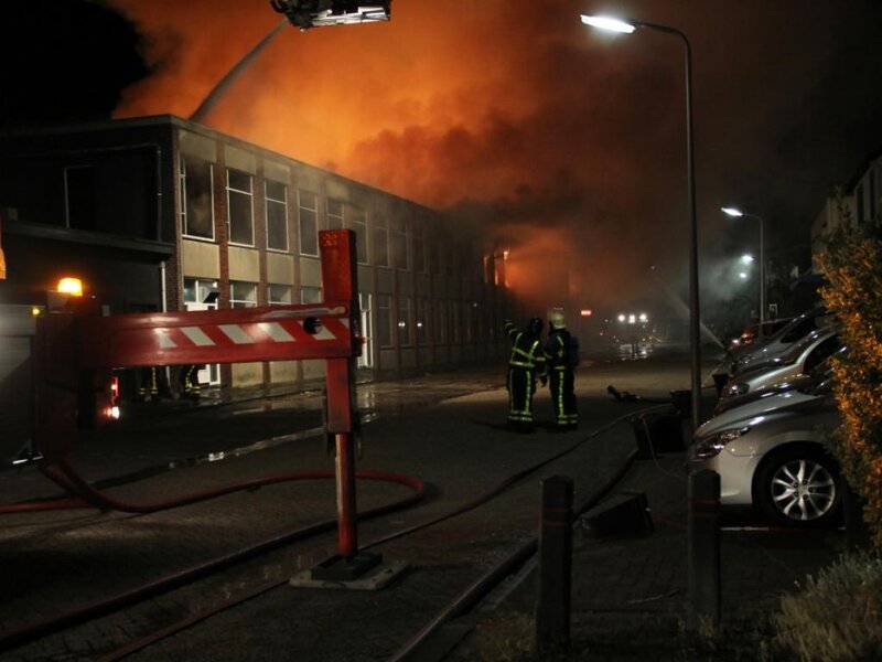 Firefighters at Building Fire — Orange