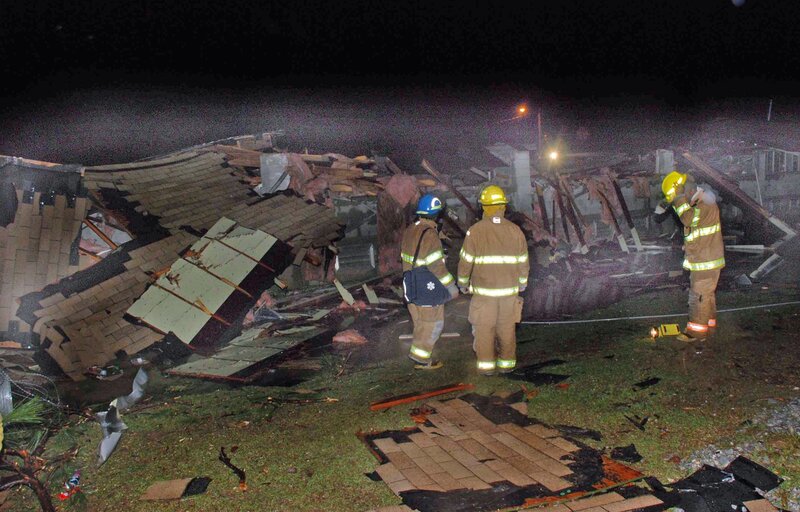 Firefighters at Wreckage