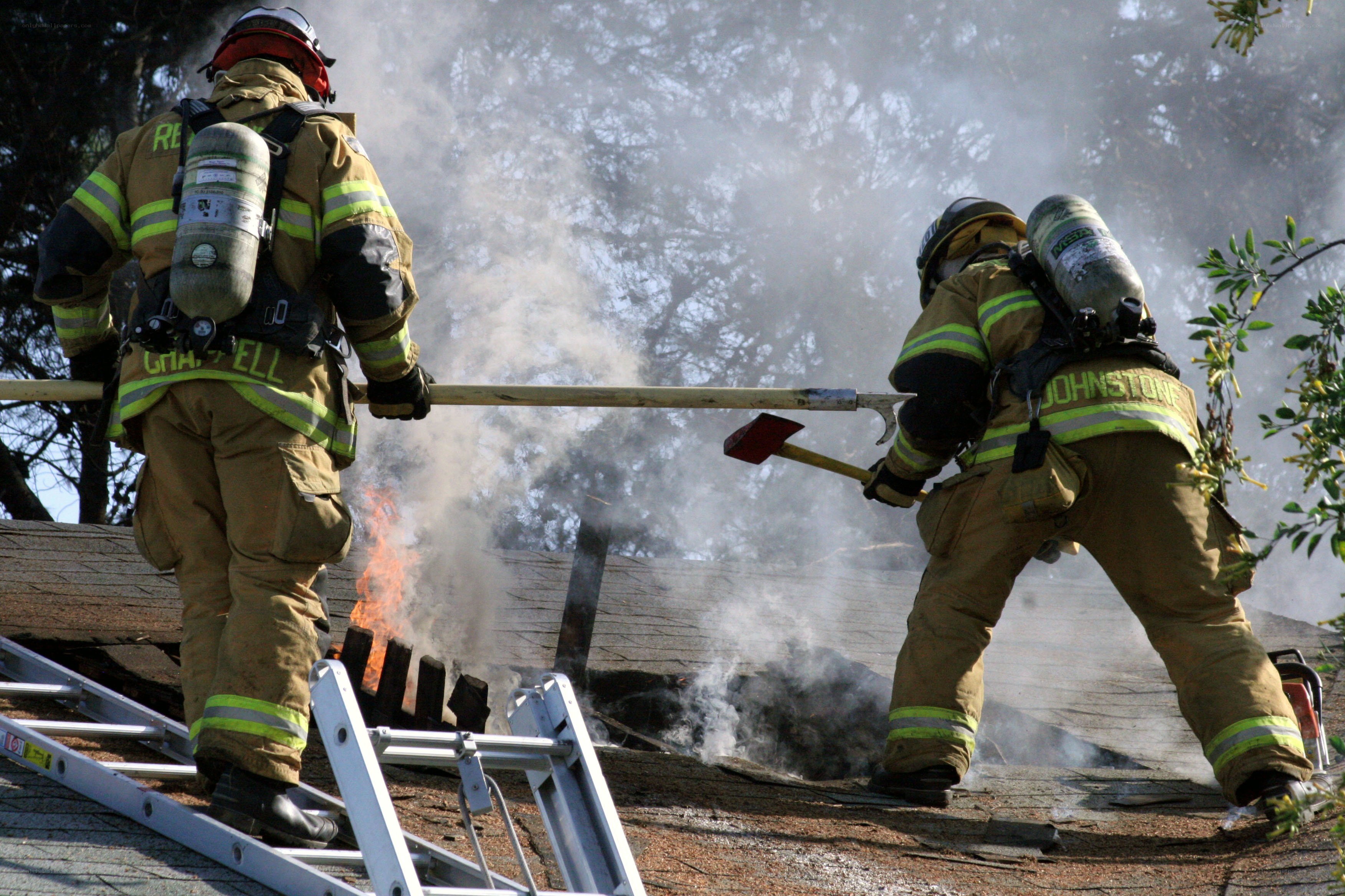 Firefighters battling rooftop blaze