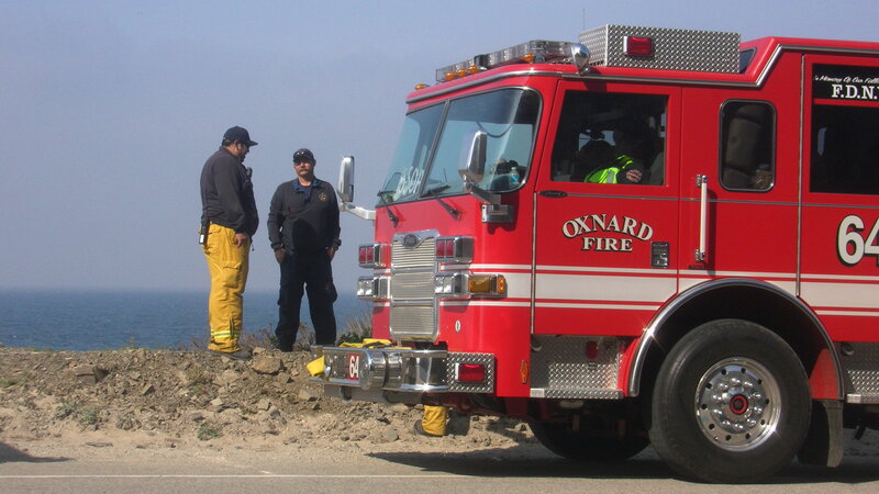 Firefighters Near Fire Truck