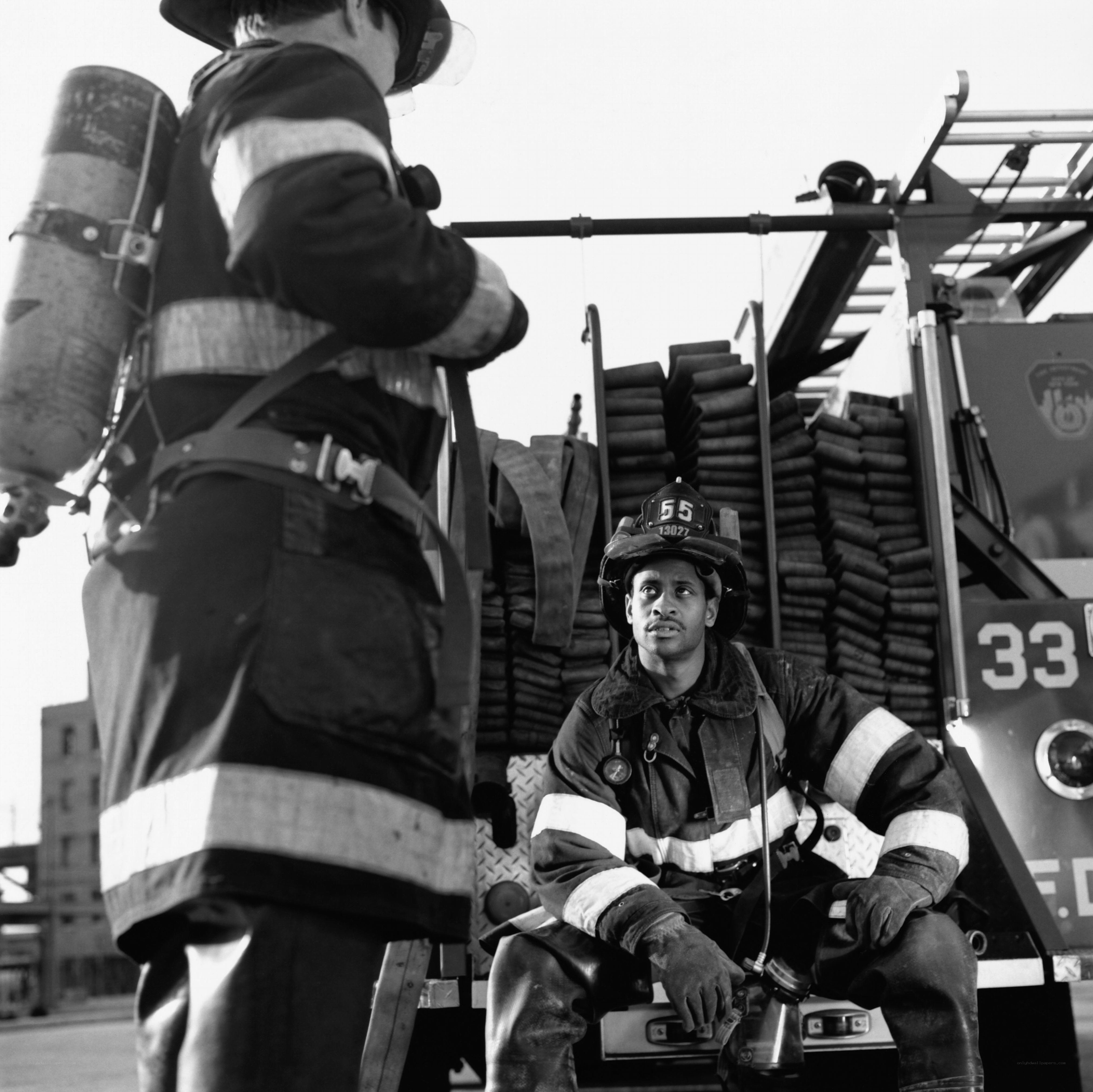 Firefighters on a fire truck