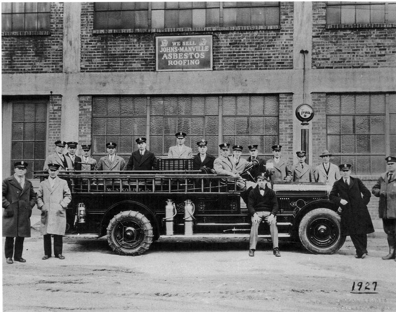 Firefighters with fire truck in 1927