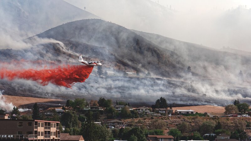 Firefighting Plane Dropping Retardant — Red