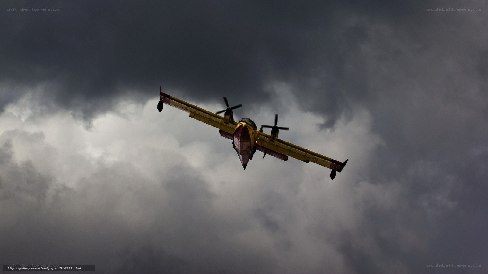 Firefighting plane in stormy sky