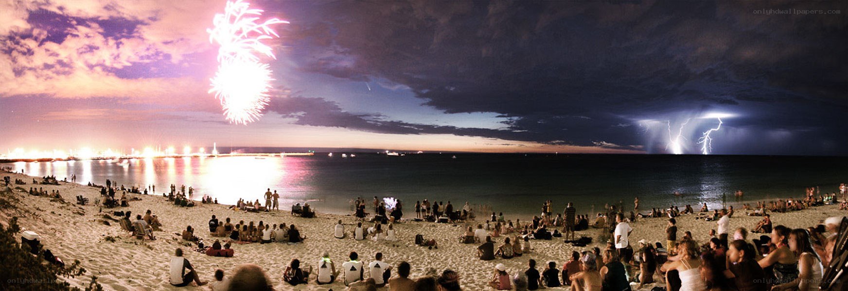 Fireworks and lightning at beach