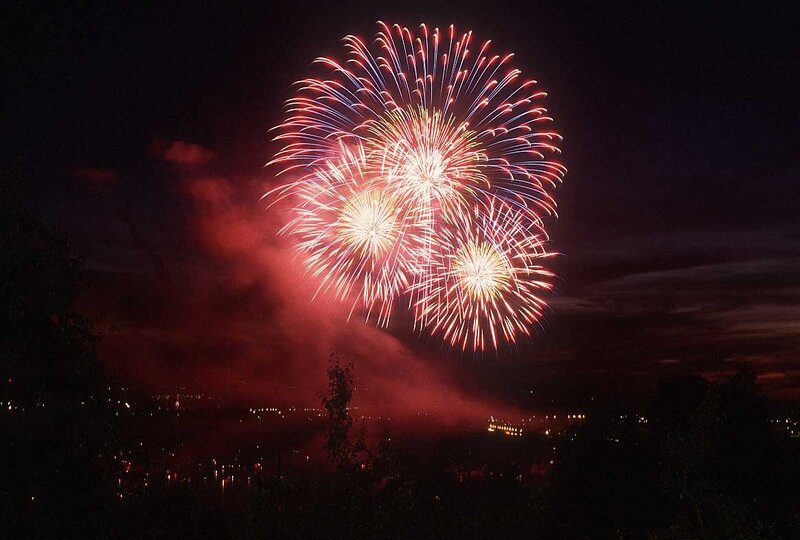 Fireworks Display over City — Red