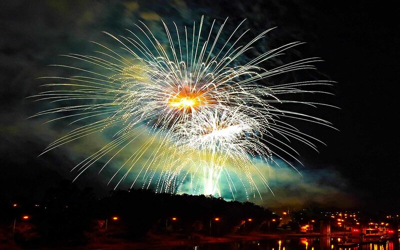 Fireworks display over water