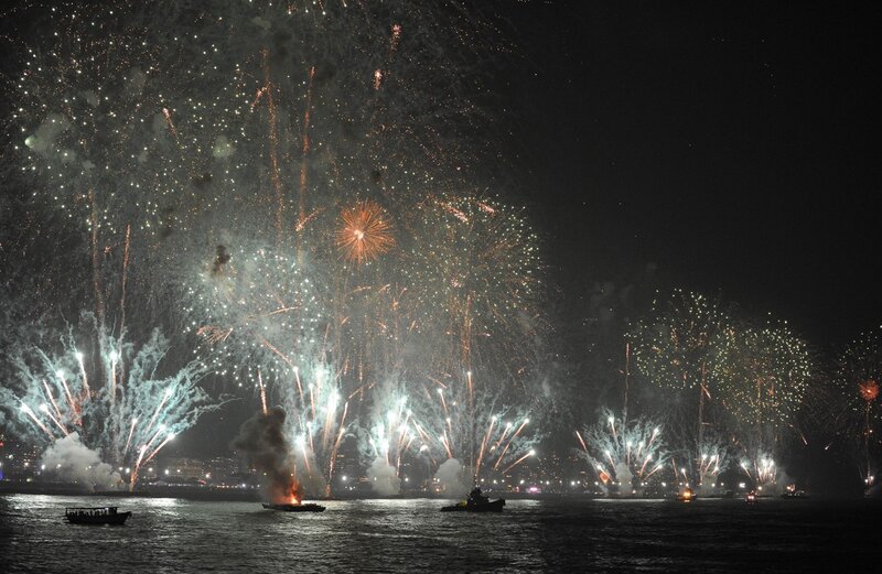 Fireworks display over water