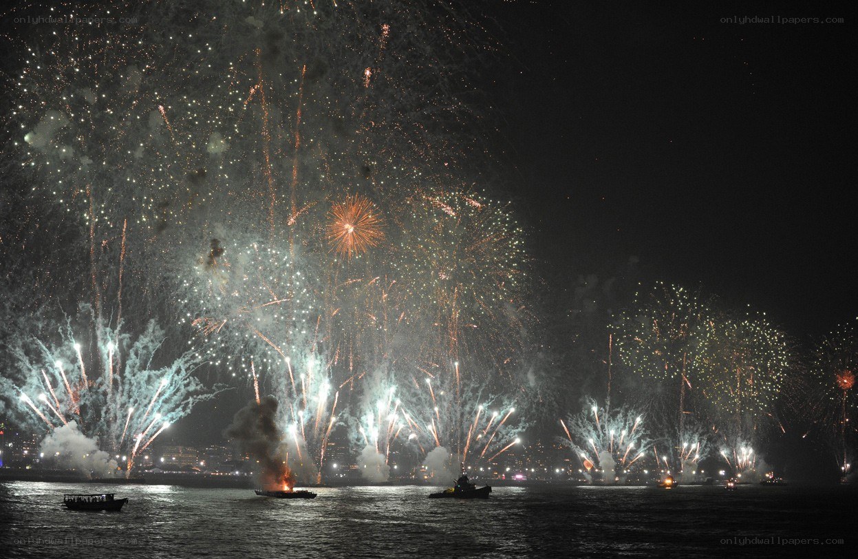Fireworks display over water