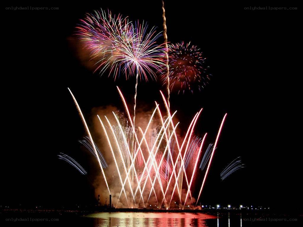 Fireworks display over water