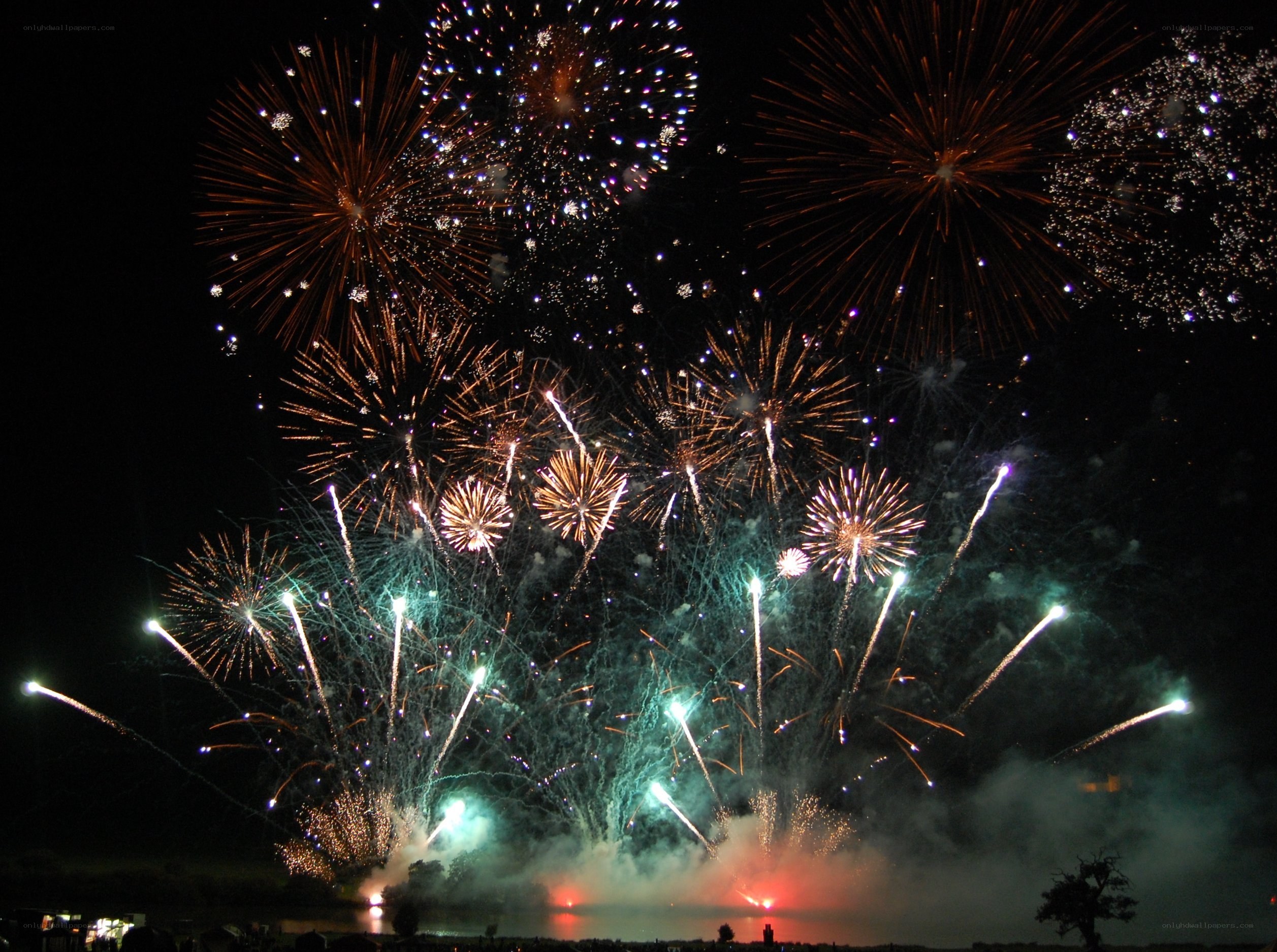 Fireworks display over water