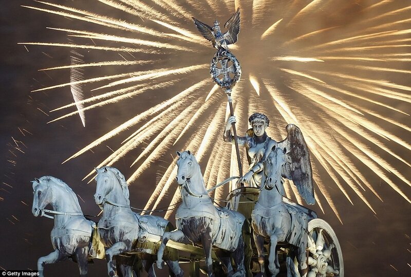 Fireworks over a chariot statue