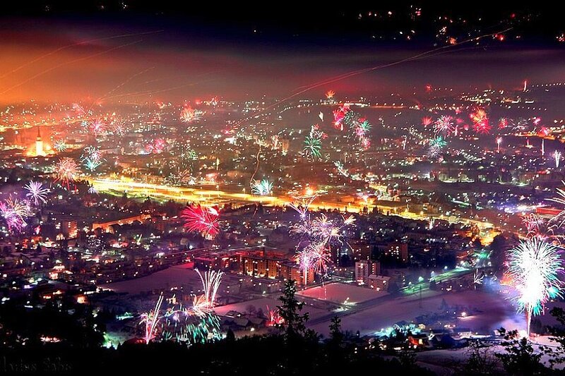 Fireworks over a city at night