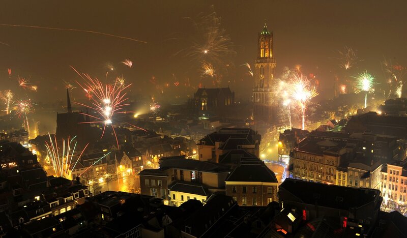 Fireworks over a city at night
