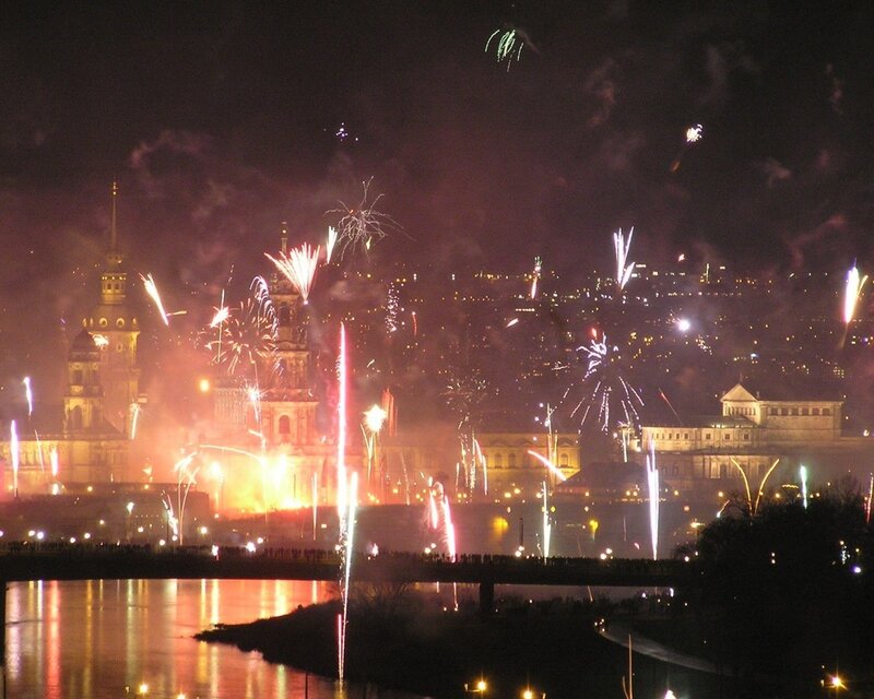 Fireworks over a city at night