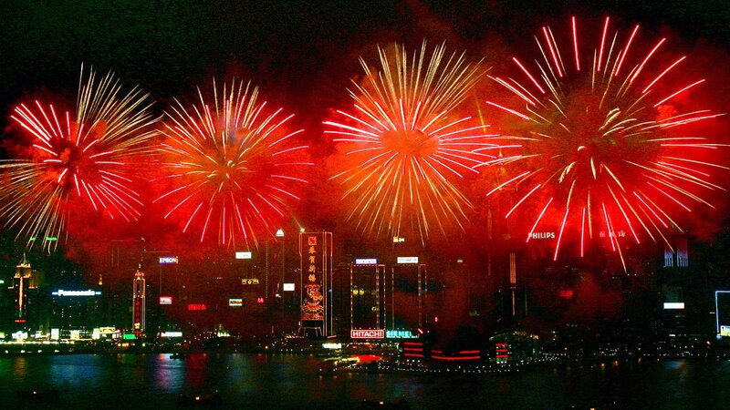 Fireworks over a city skyline