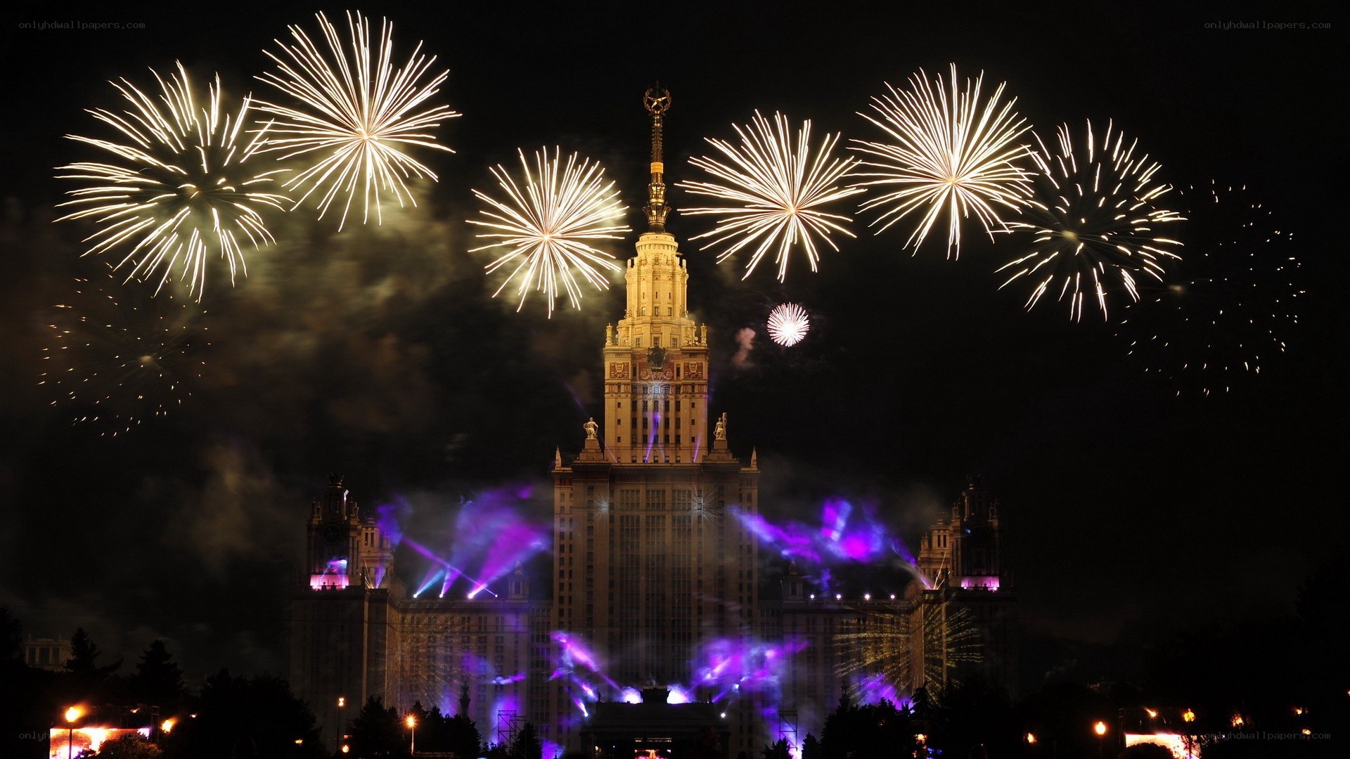 Fireworks over a grand building