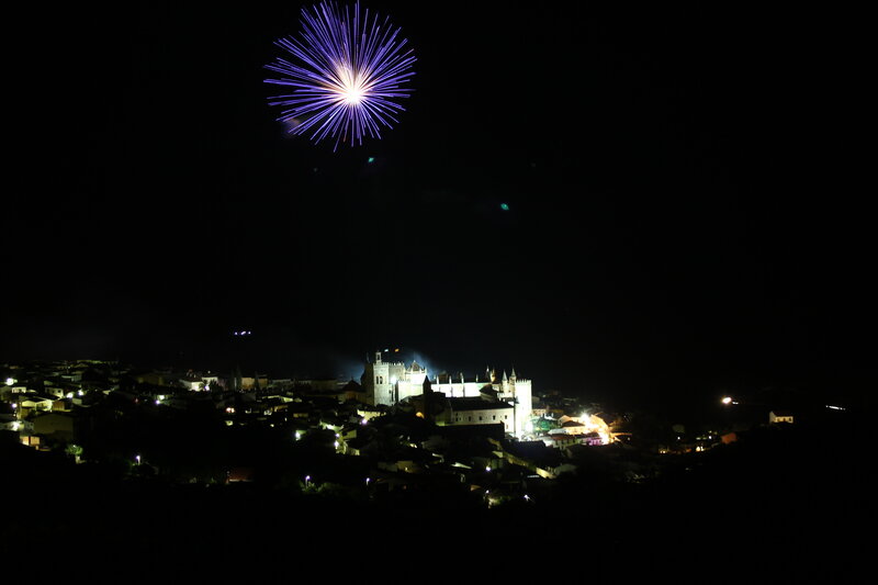 Fireworks over a historic town