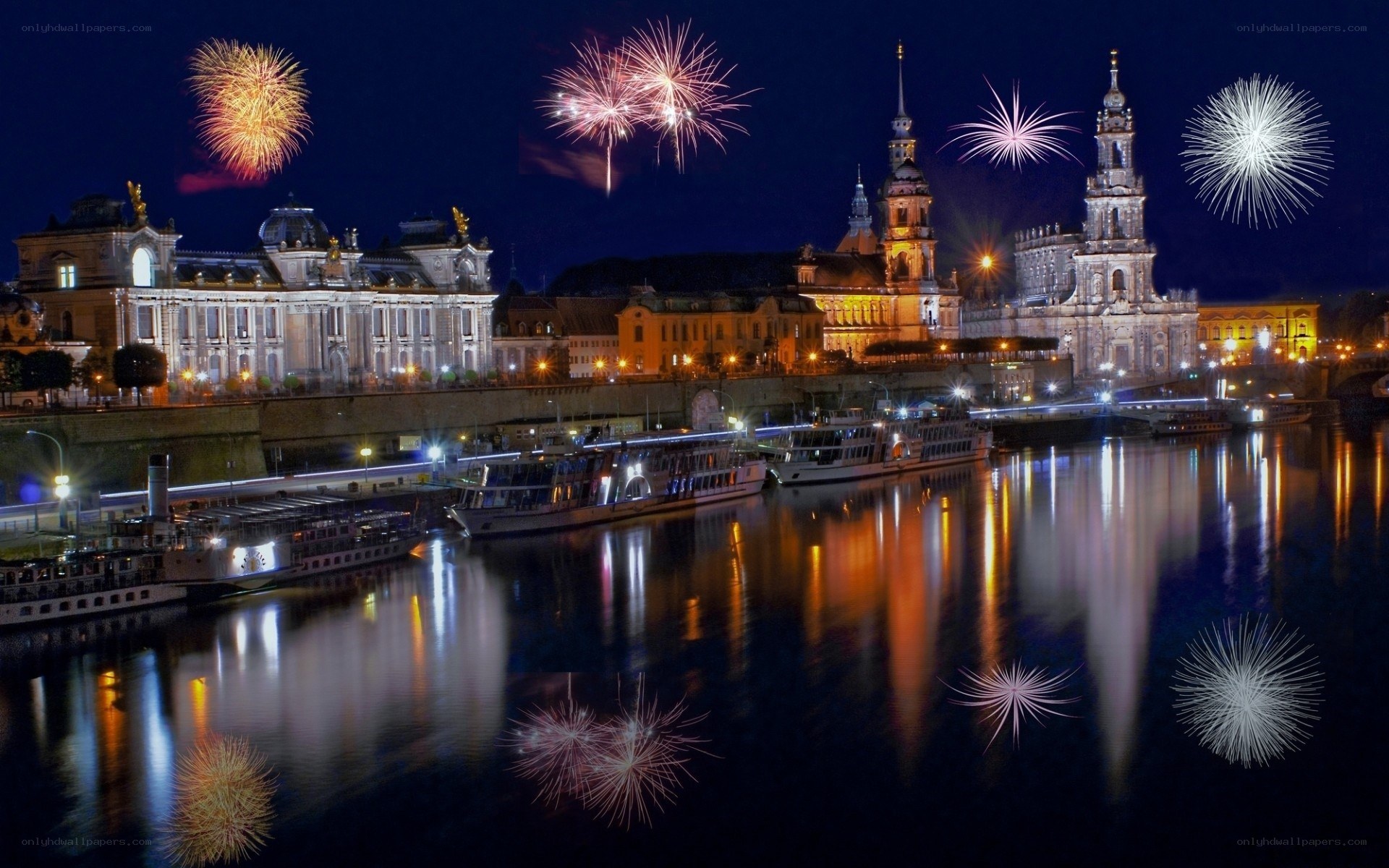 Fireworks over a river city