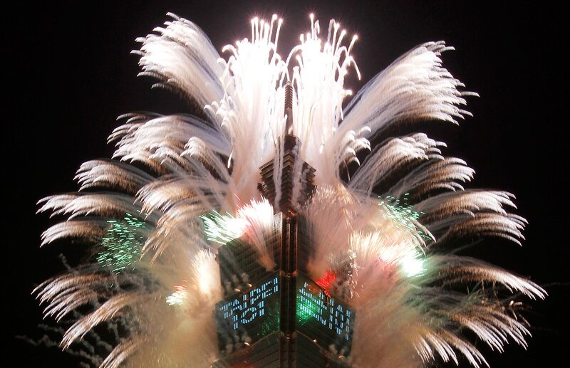 Fireworks over a skyscraper