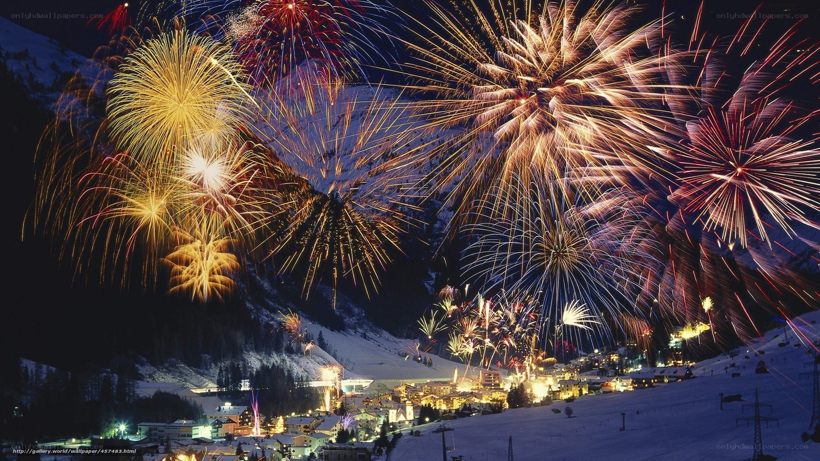Fireworks over a snowy village