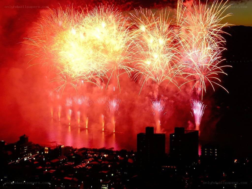 Fireworks over city at night