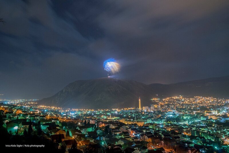 Fireworks over City — Blue, Dramatic, Night, Photograph, Mountain