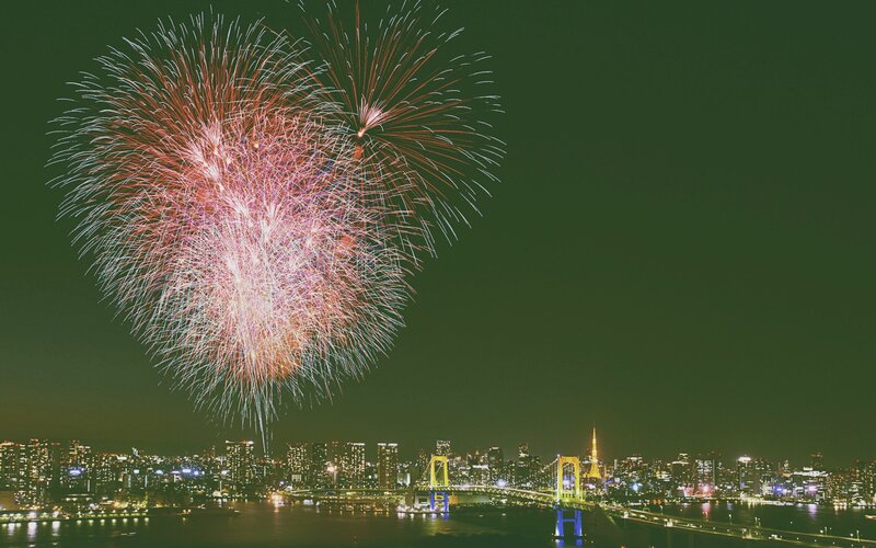 Fireworks over City — Green, Celebratory
