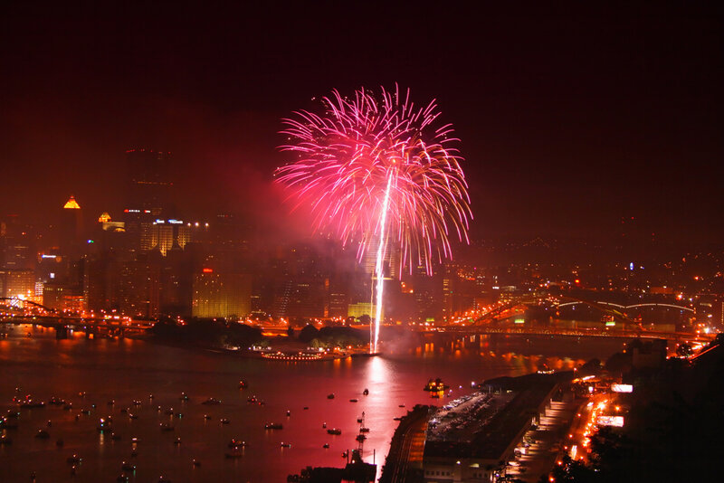 Fireworks over City — Red, Festive, Night, Photograph, City Skyline, River