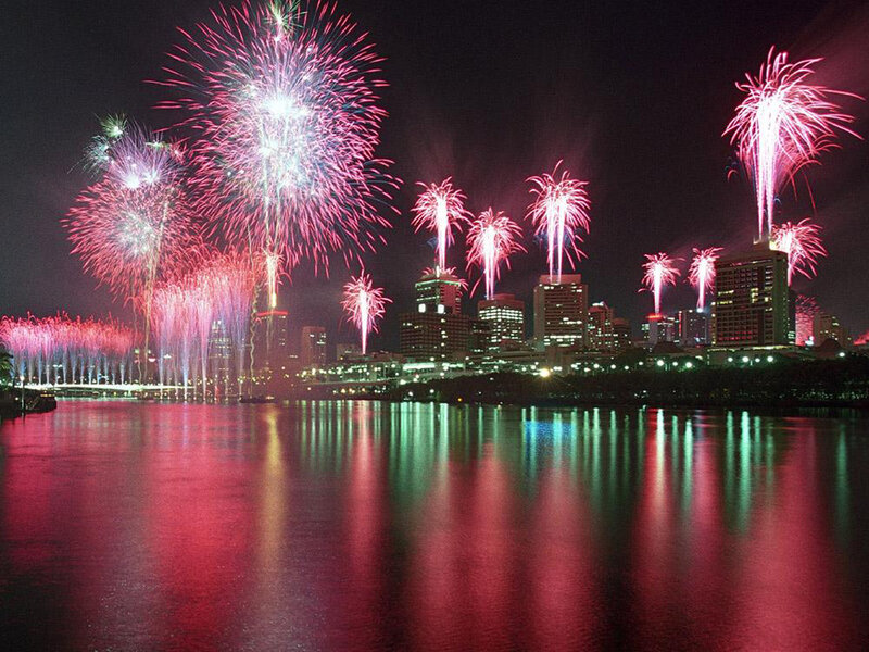 Fireworks over City — Red, Festive, Night, Photograph, City Skyline